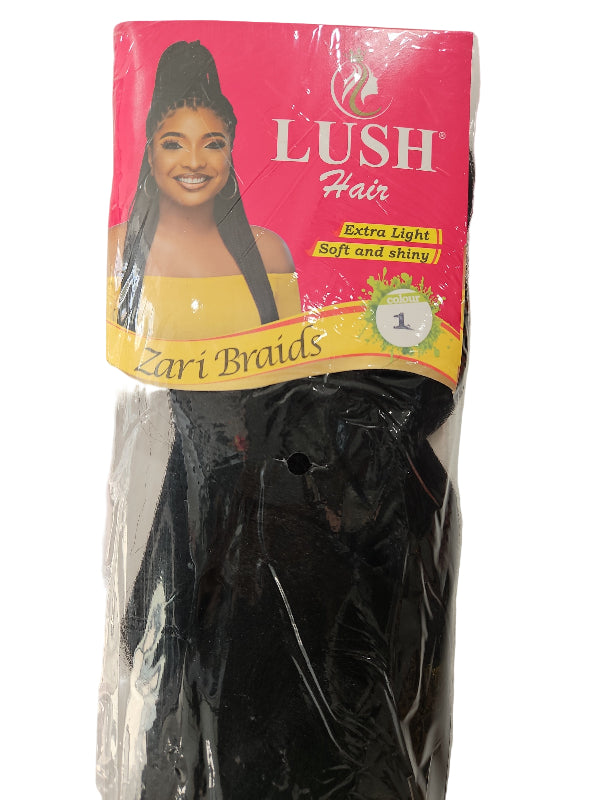 Packaged hair extensions with Lush brand label on a gray background