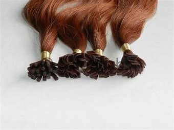 Close-up of 20" Keratin Weft Flat Tip Hair Extensions with various shades for custom fit and seamless blend.