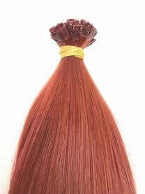 20" keratin weft flat tip hair extension in a rich auburn color, designed for seamless installation and a natural look.